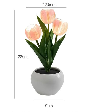 Vase of bright tulips